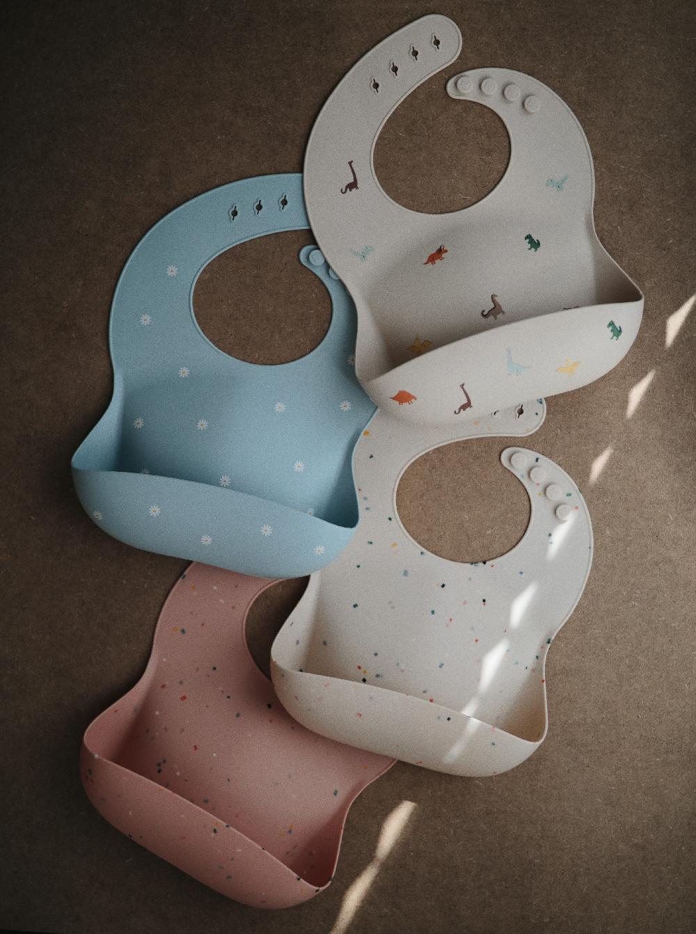 babymarkt Silikonlätzchen White Daisy Räumungsverkauf